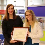 Jennifer Adams presenting Genna Callahan with her Teacher Award